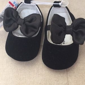 Black velvet dress shoes.